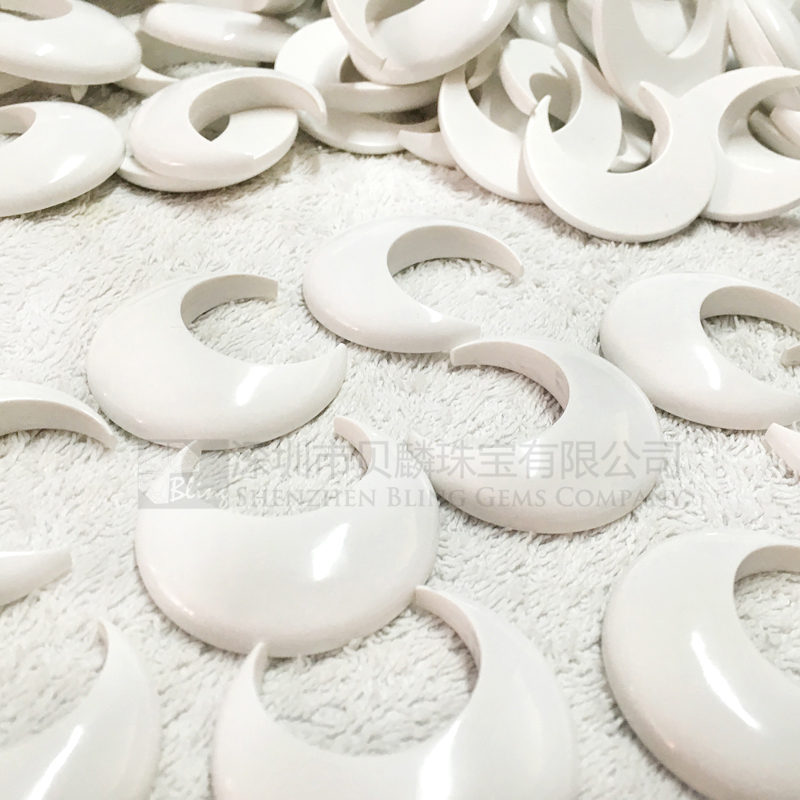 Synthetic white turquoise crescent-shaped pendants