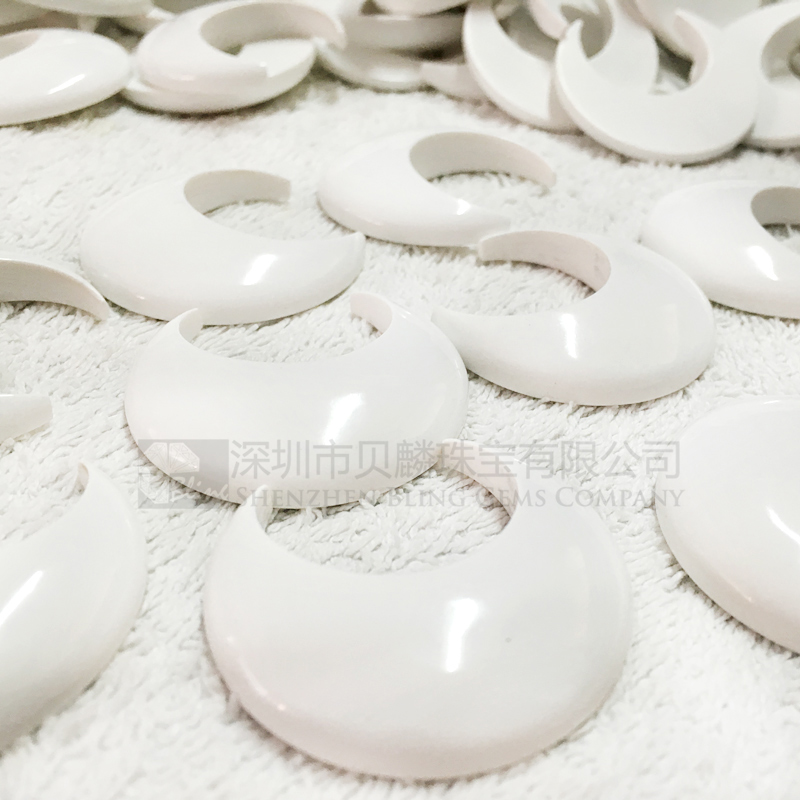 Synthetic white turquoise crescent-shaped pendants