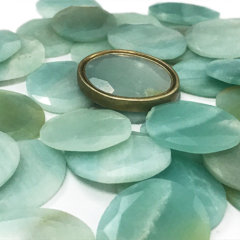 Faceted amazonite stones discs