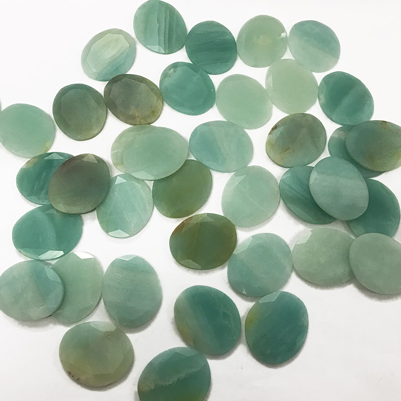 Faceted amazonite stones discs