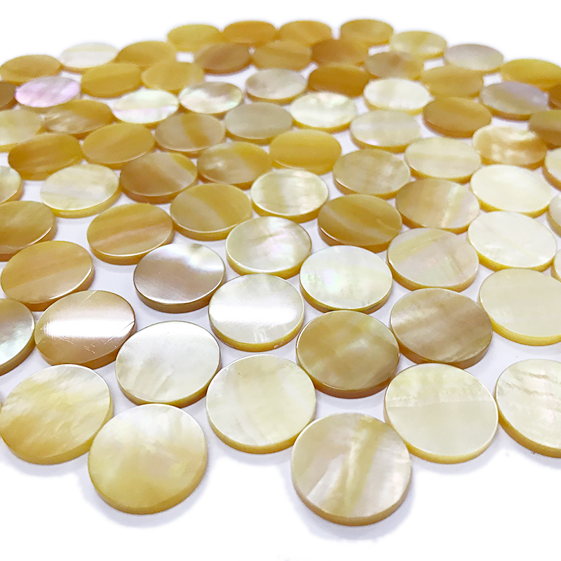 Yellow mother of pearl flat discs