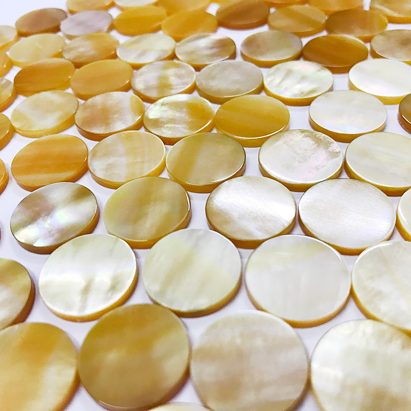 Yellow mother of pearl flat discs